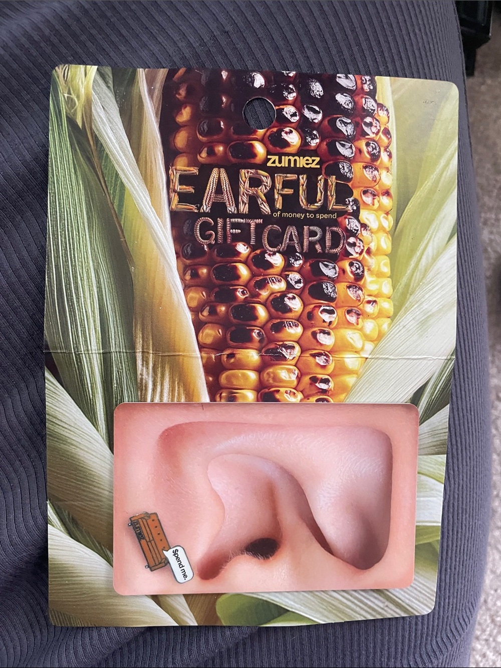 $100 Zumiez Earful Gift Card with Corn Illustration in Yellow and Green